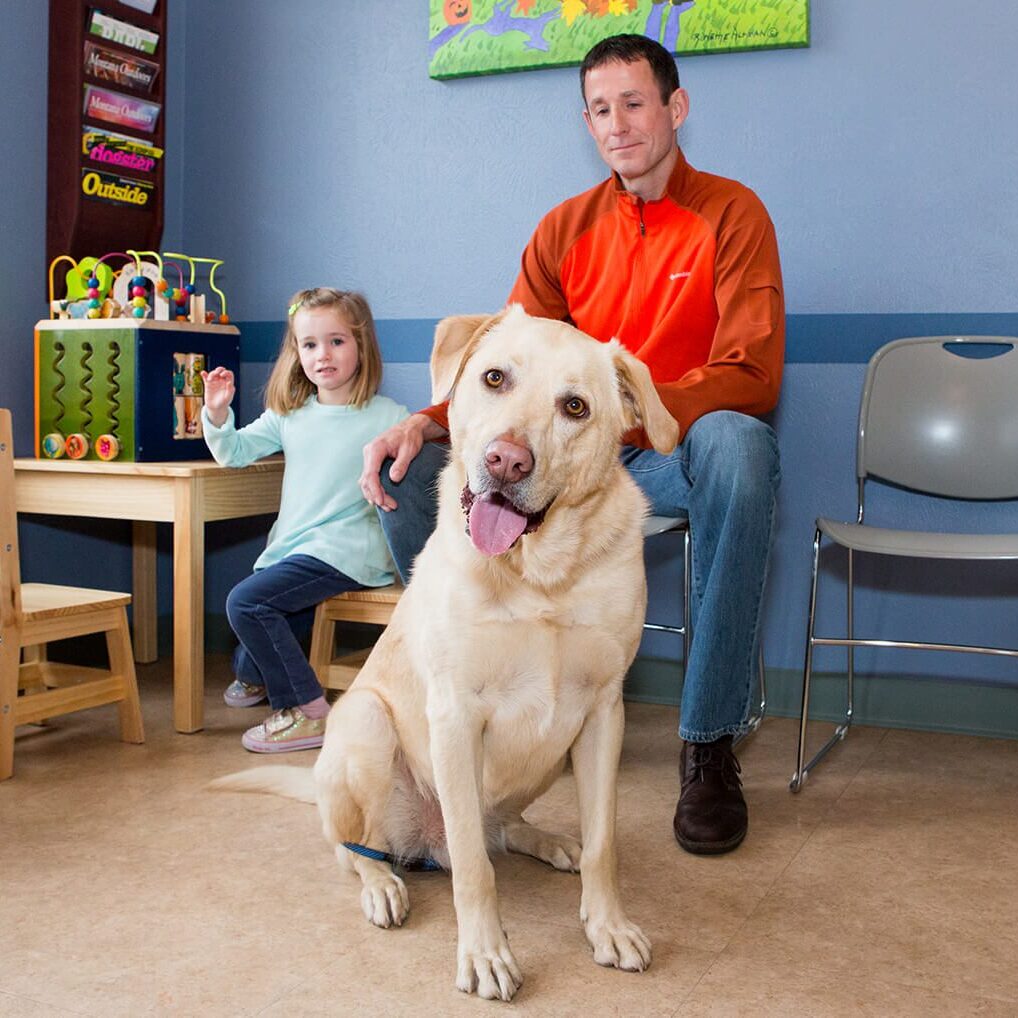 Dog And Owner In Waiting Room